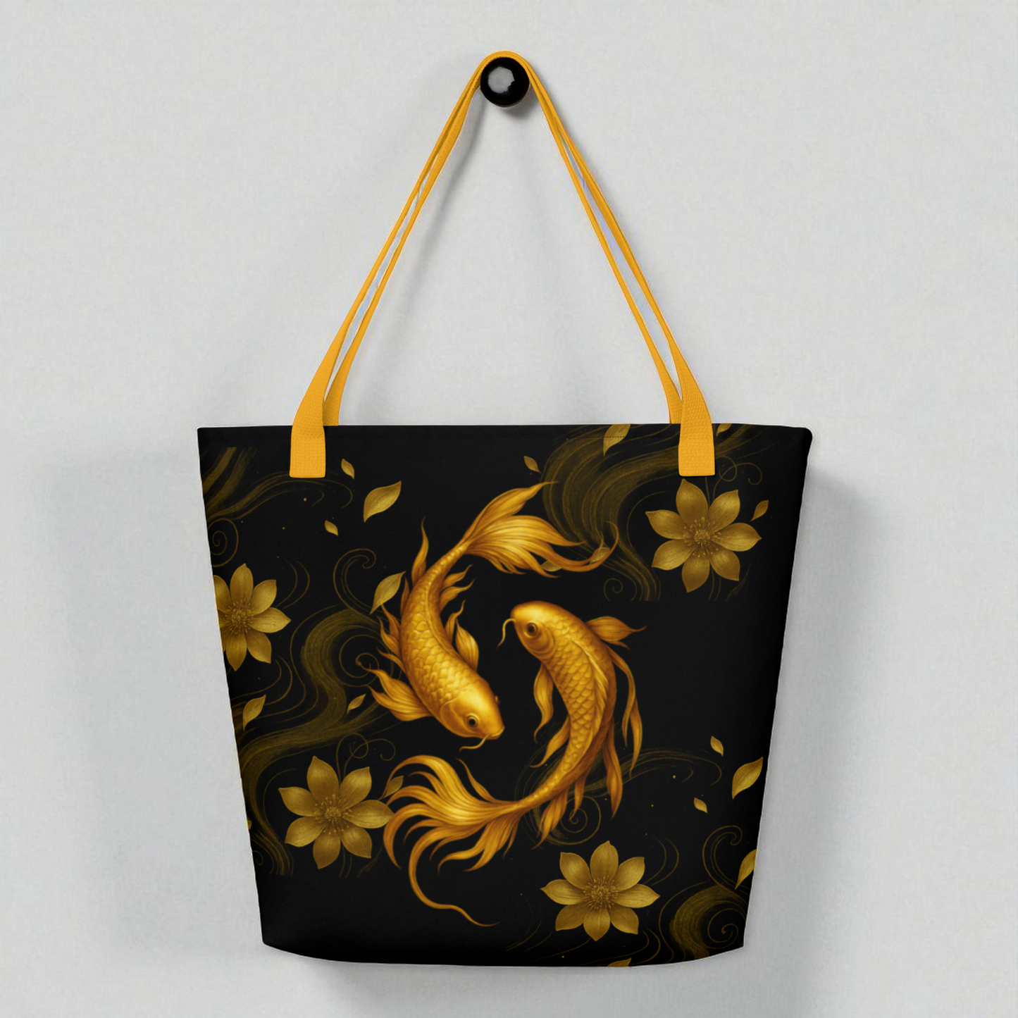 Bolso tote negro con koi dorado en espiral, vista frontal con asas doradas.