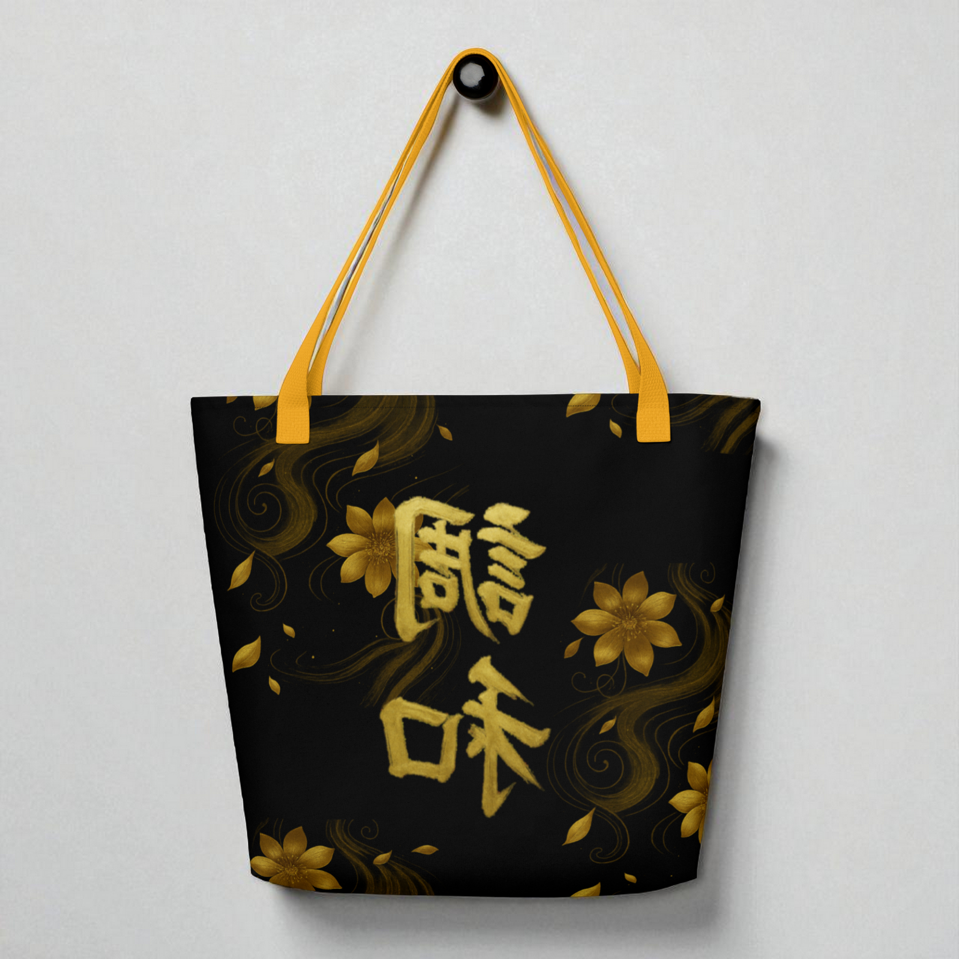 Bolso tote negro con kanji japonés de armonía en dorado, vista trasera con asas doradas.