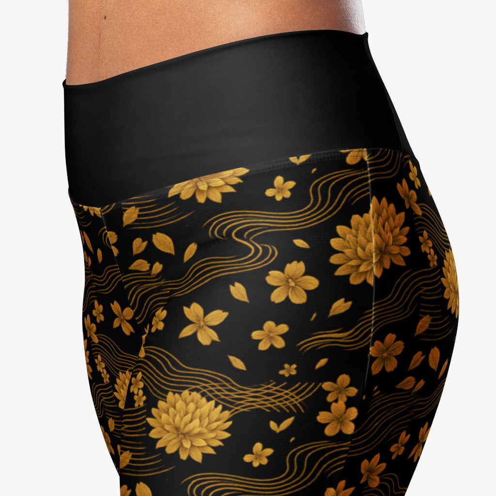 Leggings Crisantemo detalle de cintura alta y flores doradas.