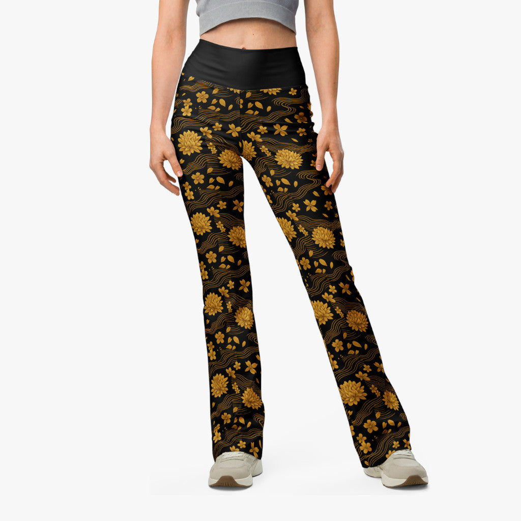 Leggings Crisantemo vista frontal con flores doradas.