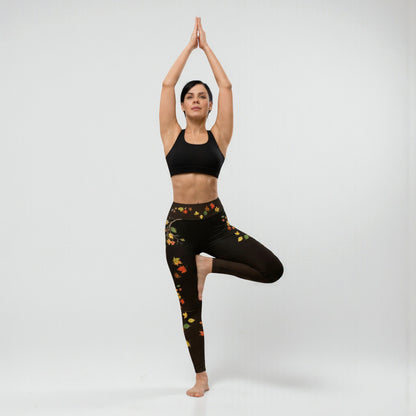 Postura de árbol yoga mostrando leggings negros con hojas otoñales
