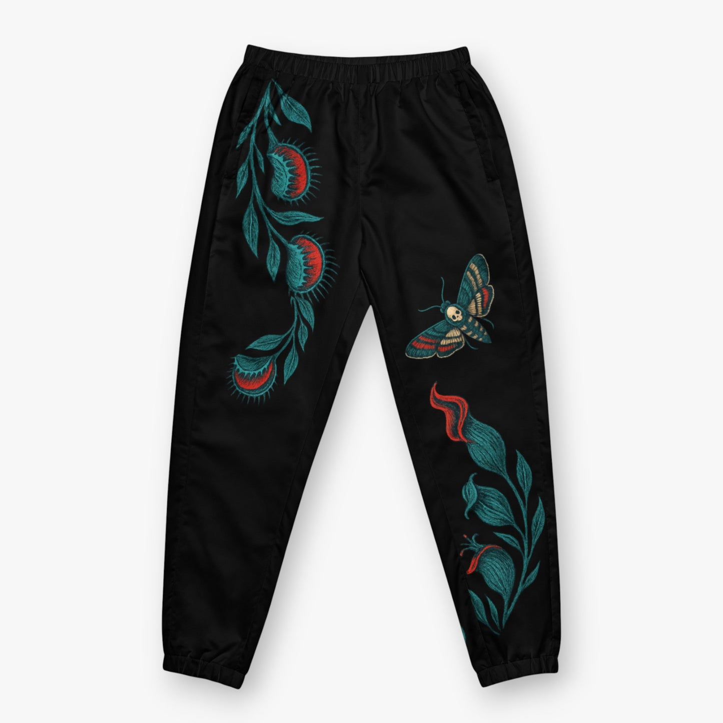 Vista delantera del pantalón , motivo botánico visible polilla calavera y carnivoras en azul