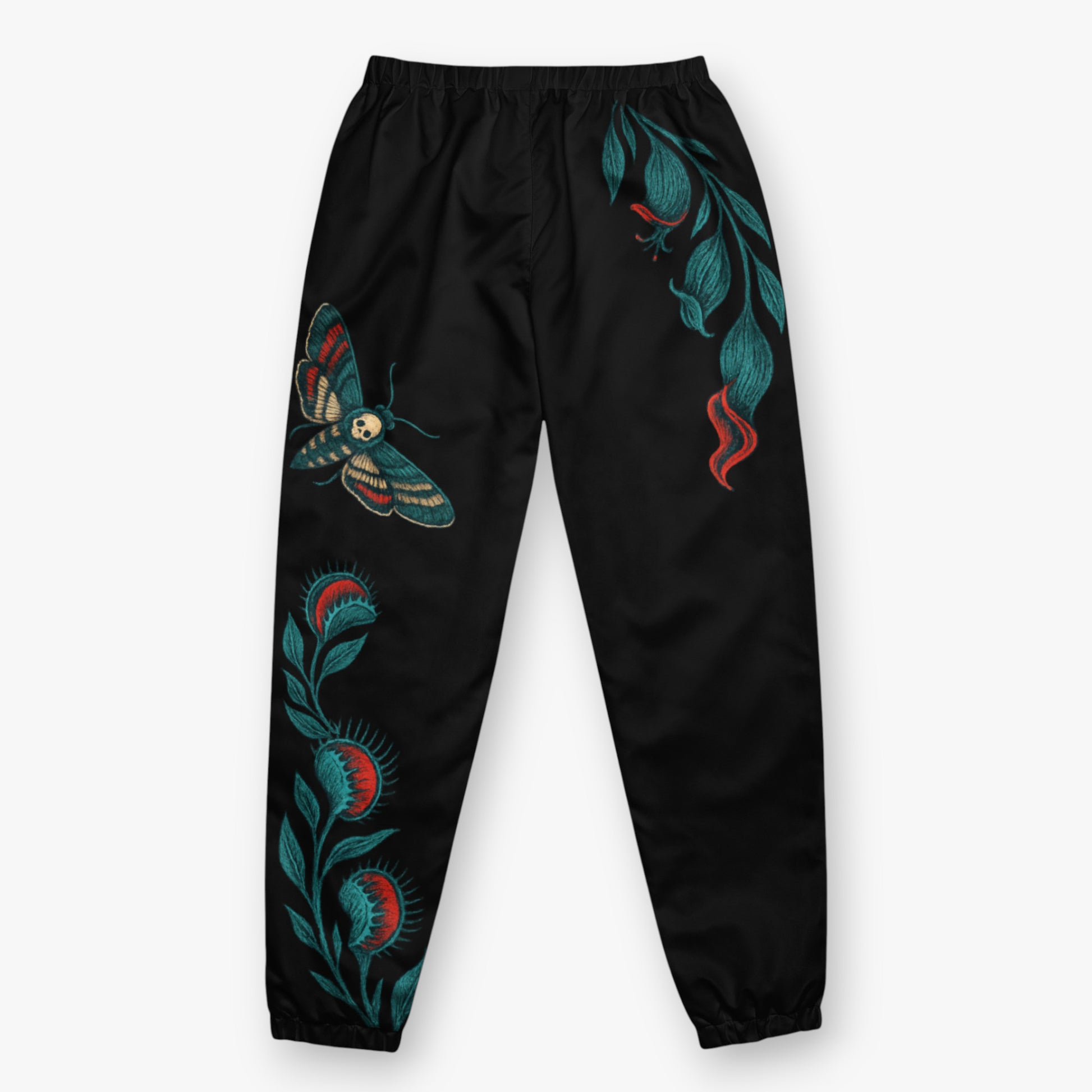 Vista posterior del pantalón , motivo botánico visible polilla calavera y carnivoras en azul