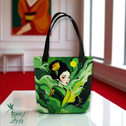 Bolso Geisha Esperanza apoyado sobre mesa junto a ventana, diseño artístico japonés exclusivo en tonos verd
