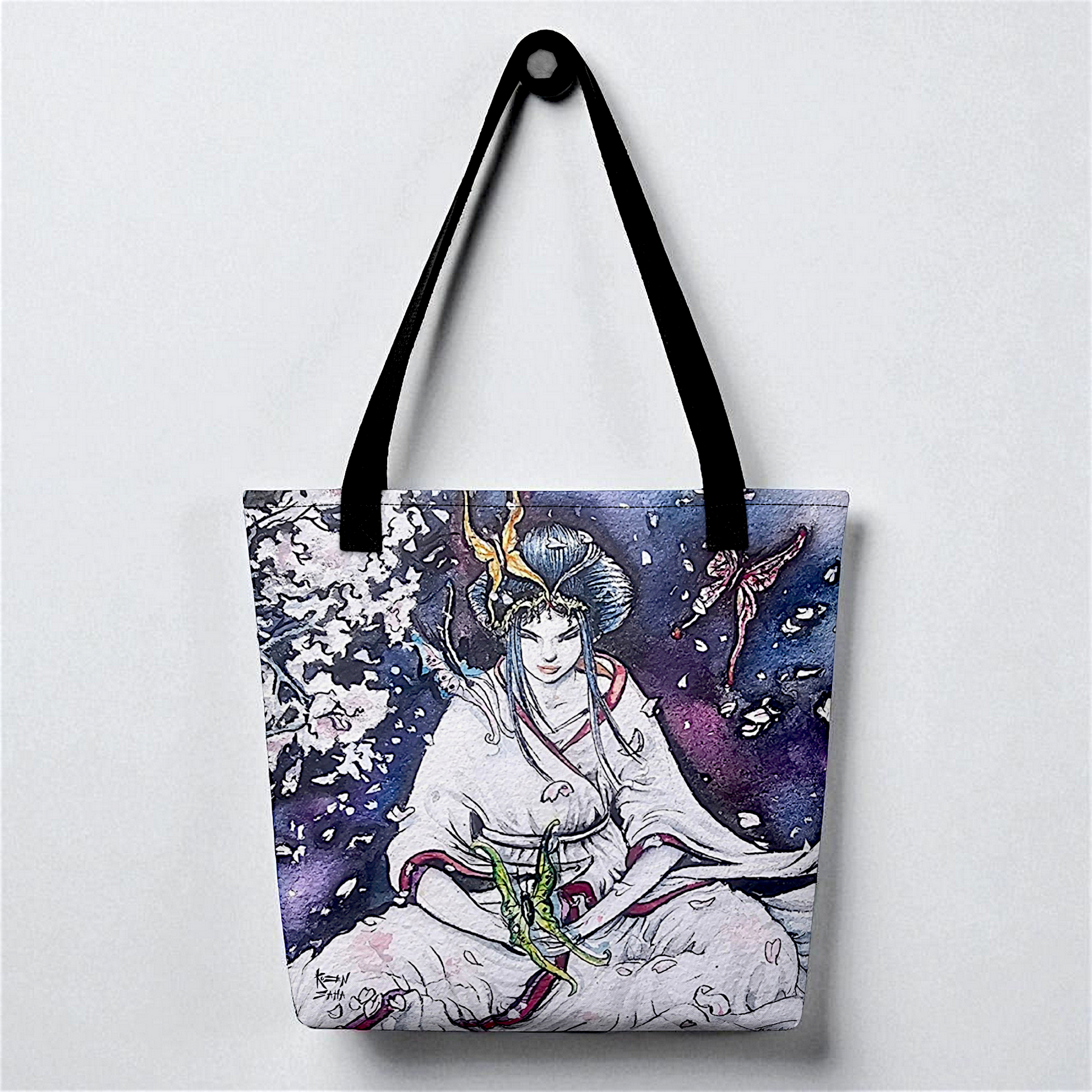 Bolso tote Paz Interior, vista frontal centrada con asas negras, fondo de pared clara, ilustración artística en tonos violeta.