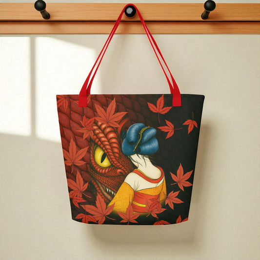 Bolso tote “El Ojo del Dragón” colgado, vista frontal con geisha y ojo de dragón, asas rojas.